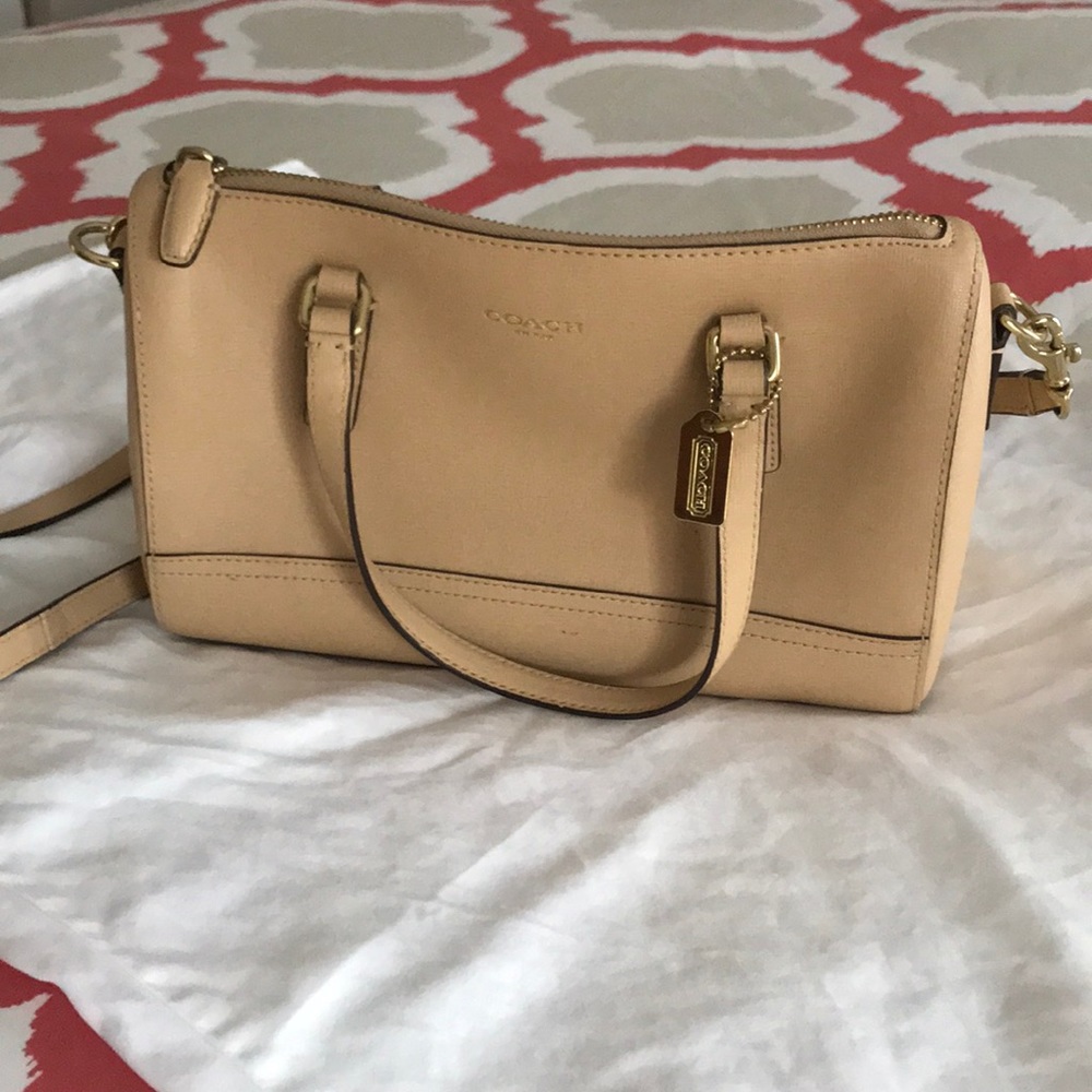 Tan Coach leather purse with long strap